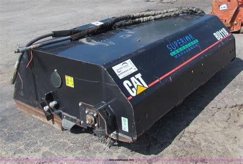 cat skid steer sweeper|street sweeper for skid steer.